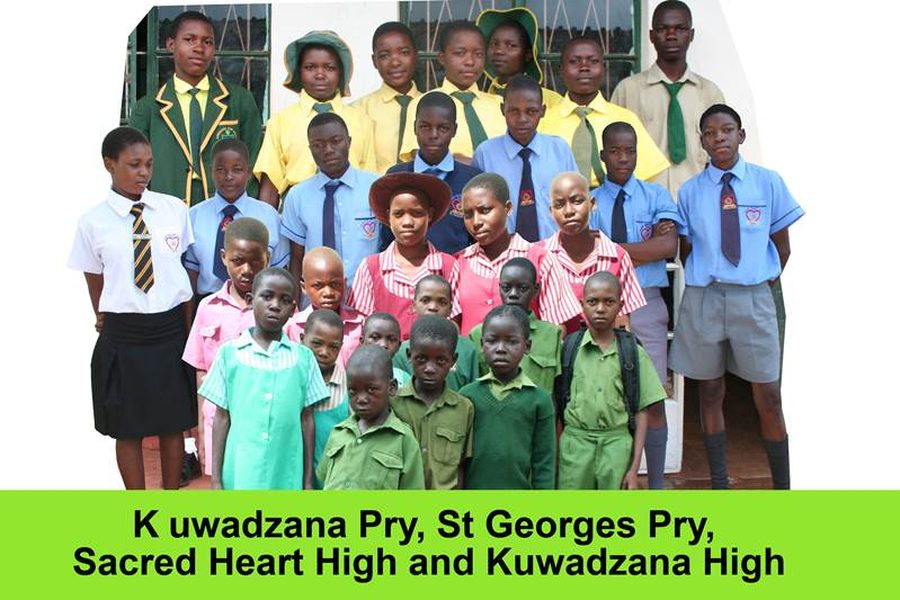 School pupils in uniform sponsored by the Mumvuri Project at Kuwadzana, St Georges, Sacred Heart and Kuwadzana High